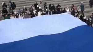 Drive. A huge tricolor deployed in Volzhsk on the day of the reunification of the Crimea with Russia